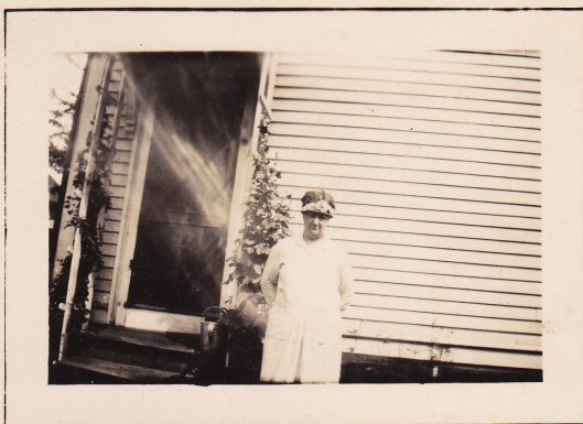 Grandma Riley outside the back door of 19 Pond Street. c1950